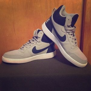Navy and gray Nike sneakers
